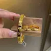 Pulsera y anillo de KT cat con sello completo brillante chapado en oro K, estilo juvenil, oro de imitación con sensación de alta gama, pulsera de círculo liso en oro arenado