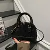 Design de lantejoulas estilo coreano transfronteiriço, moda doce e cool, nova bolsa de ombro casual de grande capacidade 2026