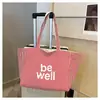 Nova Bolsa de Lona Listrada de Grande Capacidade para Primavera e Verão 2025 Bolsa de Tecido Dupla Face Feminina Estilo Coreano Estilo Ins Bolsa de Ombro Versátil