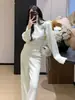 Conjunto de punto de alta gama 2026 Otoño/Invierno Nuevo Top de punto de cuello alto de cintura entallada + Pantalones rectos de pierna ancha Conjunto de dos piezas para mujer