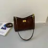 Bolso bandolera de invierno para mujer 2026 diseño de nicho personalidad casual bolso tipo bollo moda nuevo moderno bolso de hombro