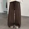 Pantalones casuales para niñas de otoño e invierno 2026 nueva moda estilo coreano sueltos de pierna ancha largos para niñas, estilo transfronterizo moderno