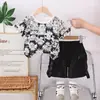 Moda Verão Novo Estilo Lindo e Bonito Conjunto Curto de Manga Curta para Crianças, Conjunto Casual de Duas Peças com Estampa Xadrez Completa