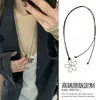 Collar de metal cruzado vintage desgastado estilo nacional Bohemio colgante de anillo largo cadena de suéter versátil moda