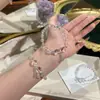 Pulsera Nueva de Cristal Blanco Forma Irregular Primavera/Verano 2026 Swarovski para Mujer Borla de Piedra Preciosa Pulsera Atrae-Riqueza Joyería de Mano de Nicho