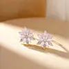 Brincos de flor de gelo na cor dopamina, cravejados de diamantes, para mulheres, únicos, bonitos e exalando uma aura sofisticada e elegante.