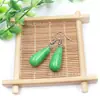 Venta al por mayor de fábrica aretes largos de cristal natural forma de gota de agua amatista Ojo de Tigre Joyería con gancho para la oreja aretes redondos de gota de agua DIY