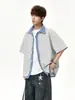 Camisa cárdigan de estilo americano de dos piezas falsas para hombre, marca de tendencia primavera/verano 2026, chaqueta casual de retazos con cuello vuelto, camisa versátil