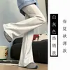 Calça Flare Estilo Americano para Mulheres Nova Coleção Primavera e Outono 2026 Cintura Alta Cordão Ajustável Modelagem Slim Caimento Fluido Emagrecimento Versátil Esportivo Casual