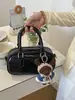 Bolso de Mano Pequeño Plateado Transfronterizo para Mujer 2026 Nuevo Estilo de Nicho Moda Coreana Bolso de Hombro Versátil Bolso Cruzado Simple