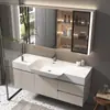 Gabinete de banheiro na cor creme com acabamento soft-touch, apresentando uma cuba grande e integrada, ideal para banheiros pequenos; um conjunto de gabinete de banheiro para lavar e enxaguar as mãos