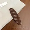 Nuevo pasador de pelo ovalado de lunares estilo coreano, pinza de tela hecha a mano para flequillo, pinza de flecos con ambiente de otoño e invierno, pasador vintage