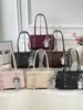 Bolso tote de nicho de alta gama estilo coreano 2026 para mujer, gran capacidad, bolso de hombro para ir al trabajo, bolso de mano moderno y versátil