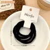 Set sencillo de gomas para el pelo en tonos marrones para niñas, bandas elásticas y duraderas para coletas y recogidos.