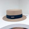 Sombrero plano de franela popular transfronterizo de otoño e invierno para parejas de hombres y mujeres, sombrero de copa de ala pequeña, sombrero de moda simple y combinable.