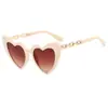 Europa y Estados Unidos nuevas gafas de sol ojo de gato montura pequeña cadena metálica gafas de sol de moda gafas de sol hip-hop callejeras transfronterizas para mujer