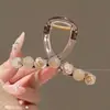 Pinza de pelo coreana de alta gama para mujer, exquisita pinza de tiburón para la parte trasera de la cabeza, pinza de pelo de verano, pasador de estrella de dibujos animados, accesorio para el cabello
