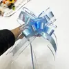 Gran salida de fábrica de cinta de flor de lazo brillante de cara brillante flor de borla tirada a mano de gasa de nieve iridiscente transfronteriza 70#