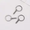 Llavero de Anillo Plano Negro Pistola de 30MM con Cadena Anillo Plano con Cadena de 4 Secciones Llavero de Metal Accesorios Hechos a Mano DIY Materiales