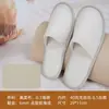 Pantuflas desechables de tela Zhenmei con suelas silenciosas antideslizantes para hoteles de gama media a alta, salones de belleza, casas de huéspedes y hospitalidad en el hogar
