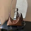 Design de Nicho High-End Bolsa de Axila Feminina 2026 Nova Popular Outono/Inverno Bolsa de Ombro Único Venda Quente Bolsa Cruzada Dumpling