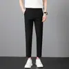 Pantalones occidentales finos de verano para hombre, de seda helada, estilo coreano, a la moda, hasta los tobillos, con colgante juvenil, rectos e informales.