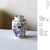 Pintura Rinyu Guisong Sonho de Flores Prósperas Porta-Chá de Cerâmica Alta Aparência Selado Lata de Armazenamento à Prova de Umidade Azul e Branco Doucai Mini