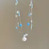 Colar Pingente Estrela-do-Mar com Casca Spray Prata Quebrada Camada Múltipla Luxo Leve Design de Nicho de Ponta Elegante Colar Versátil para Mulheres