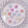 Nuevos accesorios de arte de uñas de lirio del valle galvanizado y frangipani tridimensional, piezas pequeñas de resina, decoración de uñas para pendientes DIY, pedrería