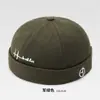 Gorra de piel de melón gorra de casero sin visera unisex moderna hip hop sombrero redondo gorra de marinero dandy primavera otoño retro versátil sombrero transfronterizo
