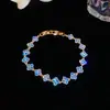 Pulsera con cierre de trébol y flor de circonita chapada en oro real de 18k, pulsera exquisita personalizada con sentido de diseño, joyería al por mayor
