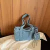 Bolsa de ombro ins transfronteiriça para mulheres, bolsa de ganga lavada vintage de nicho, bolsa tote simples de moda casual multifuncional