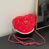 Bolsa de Mão Rombus Pérola Elegante Bolsa em Formato de Coração para Mulheres 2025 Nova Tendência Primavera e Verão Bolsa de Ombro Transversal