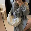 Bolsa Feminina de Alto Padrão em Formato de Chifre 2026 Nova Vintage Grande Capacidade Bolsa Transversal de Nicho Bolsa Tote de Nicho para o Dia a Dia