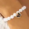 Set de Joyería de Perlas y Moños Transfronterizos Colgante de Mariposa con Goteo de Aceite Collar Pulsera Pendientes Anillo Joyería al por Mayor