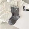 Nuevos Calcetines de Encaje de Madera Estilo Coreano Hebilla Color Sólido Lindos Rayas Verticales Media Pantorrilla Hebilla Al Por Mayor Dulces Calcetines Estilo Japonés Mujer