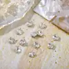 Arte de unhas de celebridade flor de ameixa diamante pontiagudo super brilho cristal transparente rosa champanhe decoração de unha fábrica de diamantes atacado