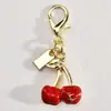 Llavero de Cereza Bolsita de Joyería Colgante Moda Exquisito Cristal Resina Cereza Colgante para Llave de Coche Mujeres