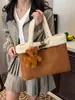 Moda de Invierno Bolso de Gran Capacidad para Debajo del Brazo para Mujer 2025 Nuevo Bolso Tote de Gamuza Bolso de Hombro Versátil de Felpa