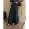 Falda de punto de longitud media para mujer, nueva colección otoño/invierno 2026, con un estilo coreano fluido y casual, cintura alta y una silueta amplia en A.
