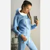 2025 Moda Europeia e Americana Outono e Inverno Amazon Venda Quente Tecido Fleece Moda Carimbo de Couro Manga Longa com Capuz Casual Conjunto Esportivo