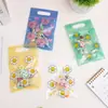 En Stock Bolsas de Regalo con Cierre Autocierre Florales de Cara Sonriente de Mano Empaques para Dulces Bandas Elásticas Scrunchies Joyería Pasador