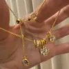 Pulsera de trébol de cuatro hojas con paspartú retro francés de lujo ligero para mujer, círculo de flores de circonita de alta gama, joyería exquisita al por mayor