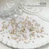 Variedade de Acessórios de Nail Art Strass de Fundo Plano Transfronteiriços, Strass Irregulares de Fundo Plano Cor Champanhe, Venda Direta do Fabricante de Acessórios de Nail Art