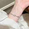 Pulseira Branca de Madrepérola de Luxo Leve para Mulheres, Design de Nicho de Alto Padrão, Flor de Quatro Folhas, Zircônia em Forma de Coração, Joia de Mão Ajustável Venda por Atacado