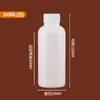 En stock, venta al por mayor, 20, 50 y 100 ml, botellas de plástico blancas de PE, pequeñas botellas de muestra, botellas de líquido selladas.