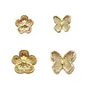 Novedad caliente joyería de flor dorada rica para uñas mariposa diy tamaño grande pequeño decoración de uñas venta al por mayor