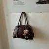 Bolsa feminina vintage transfronteiriça, grande capacidade, nova moda 2026, bolsa de ombro de nicho para o dia a dia, bolsa de braço estilosa