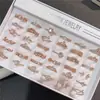 Versión coreana de anillo geométrico simple micro incrustado de circón al por mayor color dorado chapado en oro real anillo delgado estilo Ins para mujer lote mixto