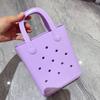 Bolsa de Gelatina 2026 Novo Modelo Transfronteiriça DIY Bolsa Perfurada Bolsa Feminina Cor Macaron Cesta de Higiene Pessoal de Praia Bolsa de PVC